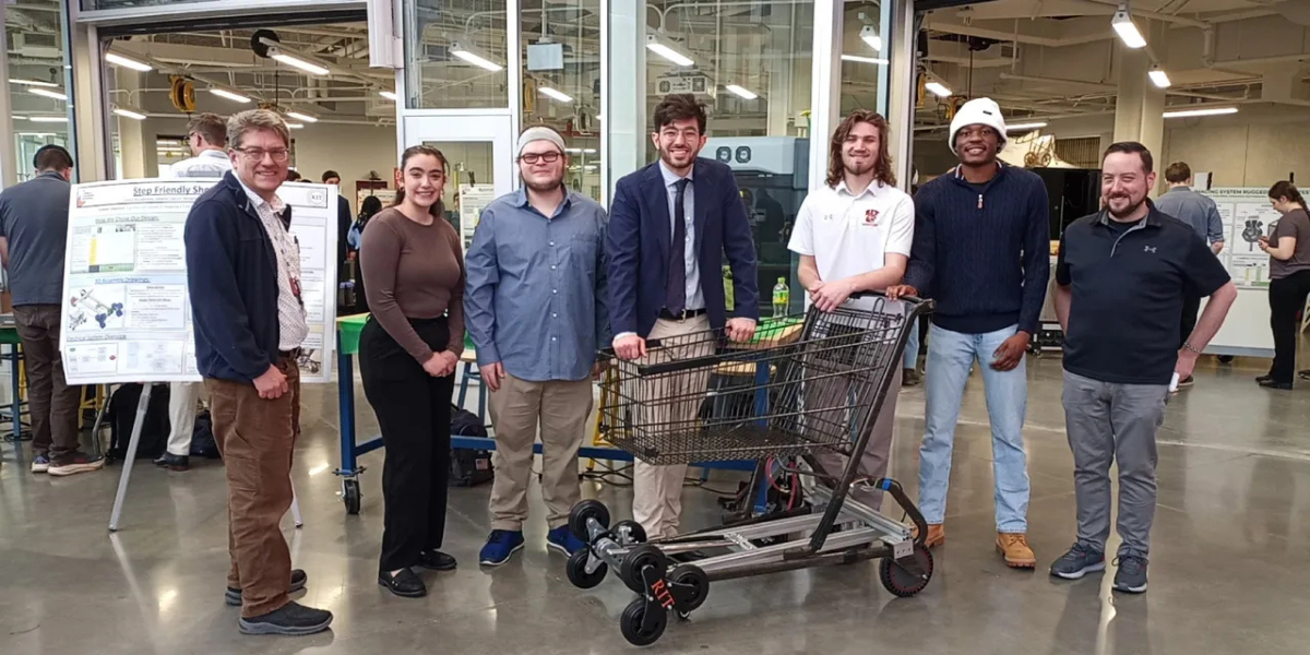 Students with the adapted shopping cart