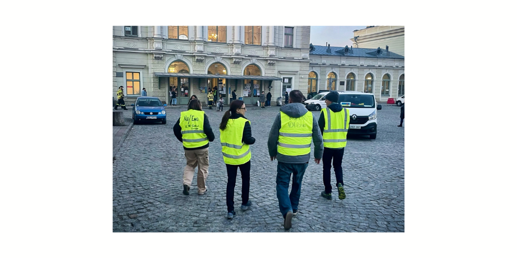 volunteers at the train station