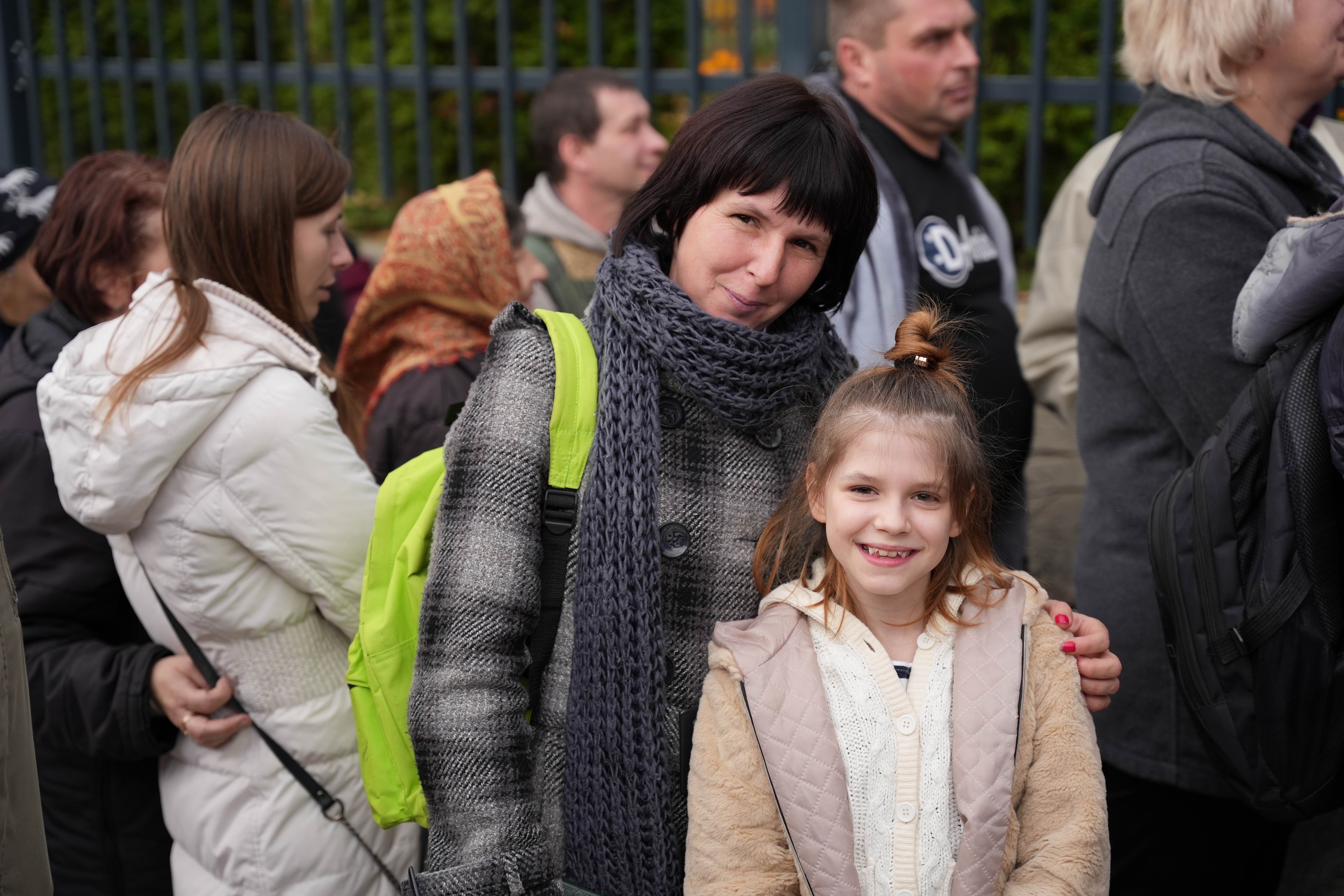 woman and child in line for food