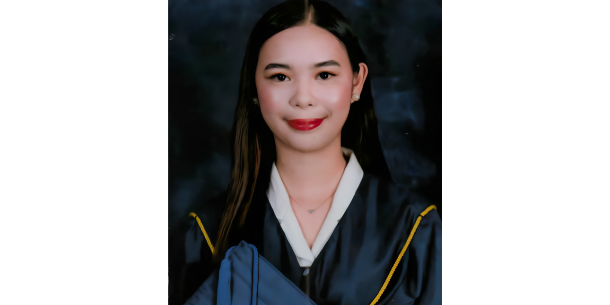 Jenny in her graduation regalia