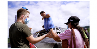 Nazarenes distributing food in Peru