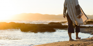 woman walking on beach